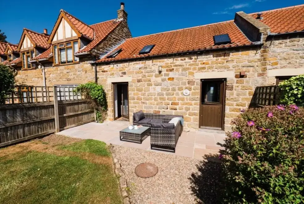 Patio area at Wren Cottage at Low Moor Holiday Cottages