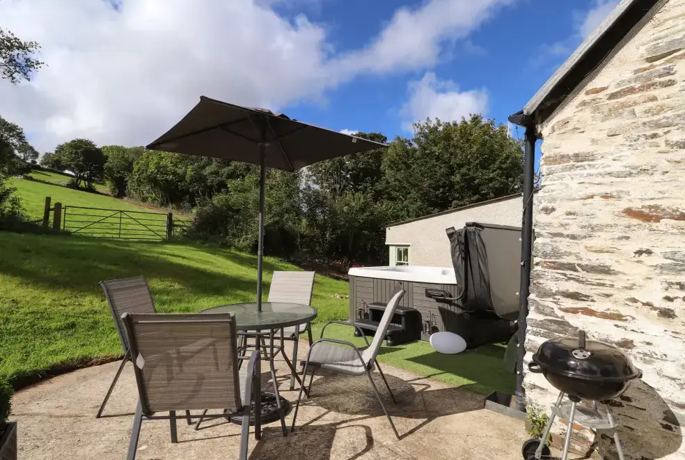 Patio area at Y Felin at Coed Cadw