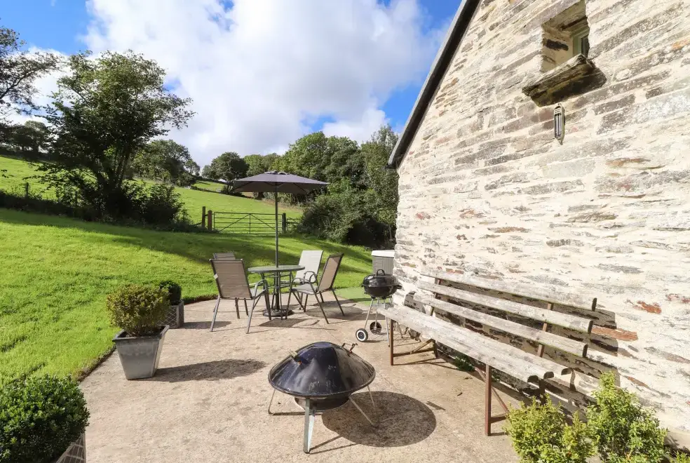 Patio area at Y Felin at Coed Cadw