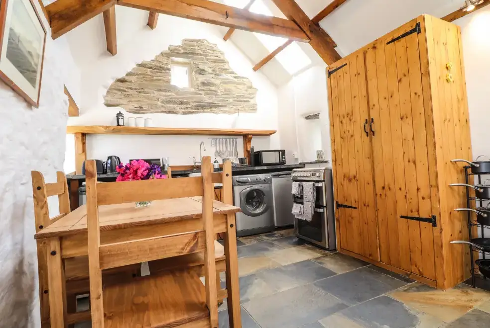 Farmhouse style kitchen at Y Felin at Coed Cadw