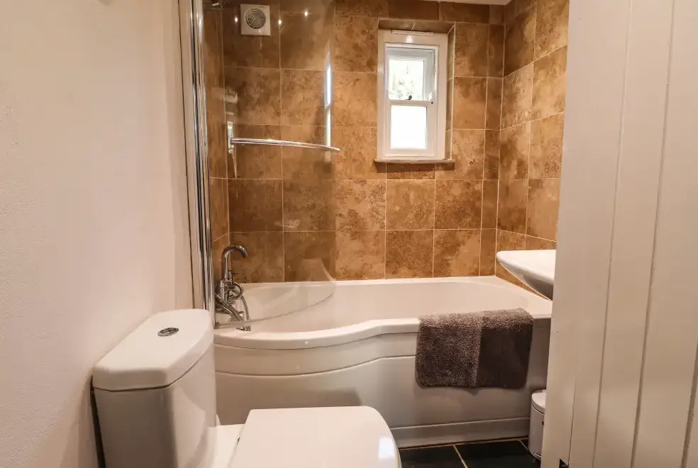 Family bathroom at Y Felin at Coed Cadw