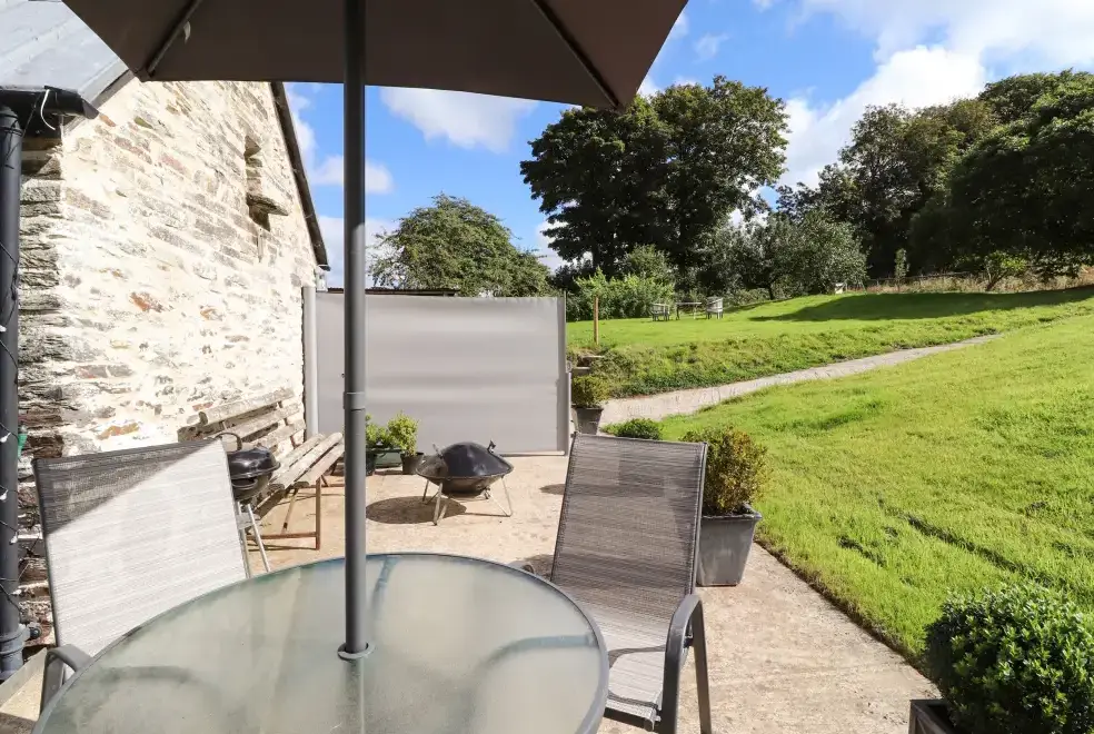 Patio area at Y Felin at Coed Cadw