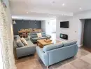 Open plan living area at Ysgubor Tyddyn Isaf - thumbnail photo