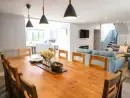 Open plan living area at Ysgubor Tyddyn Isaf - thumbnail photo