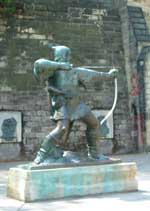Nottingham Castle with statue of Robin Hood