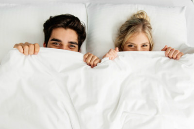 Couple sleeping in bed